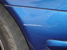 scratch damage photo of scratch damage